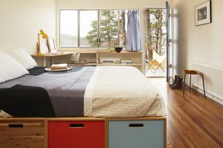 Experience Cape Cod Modern by Staying at the Midcentury Weidlinger House - Photo 8 of 8 - The bedroom opens to the wrap-around deck. 