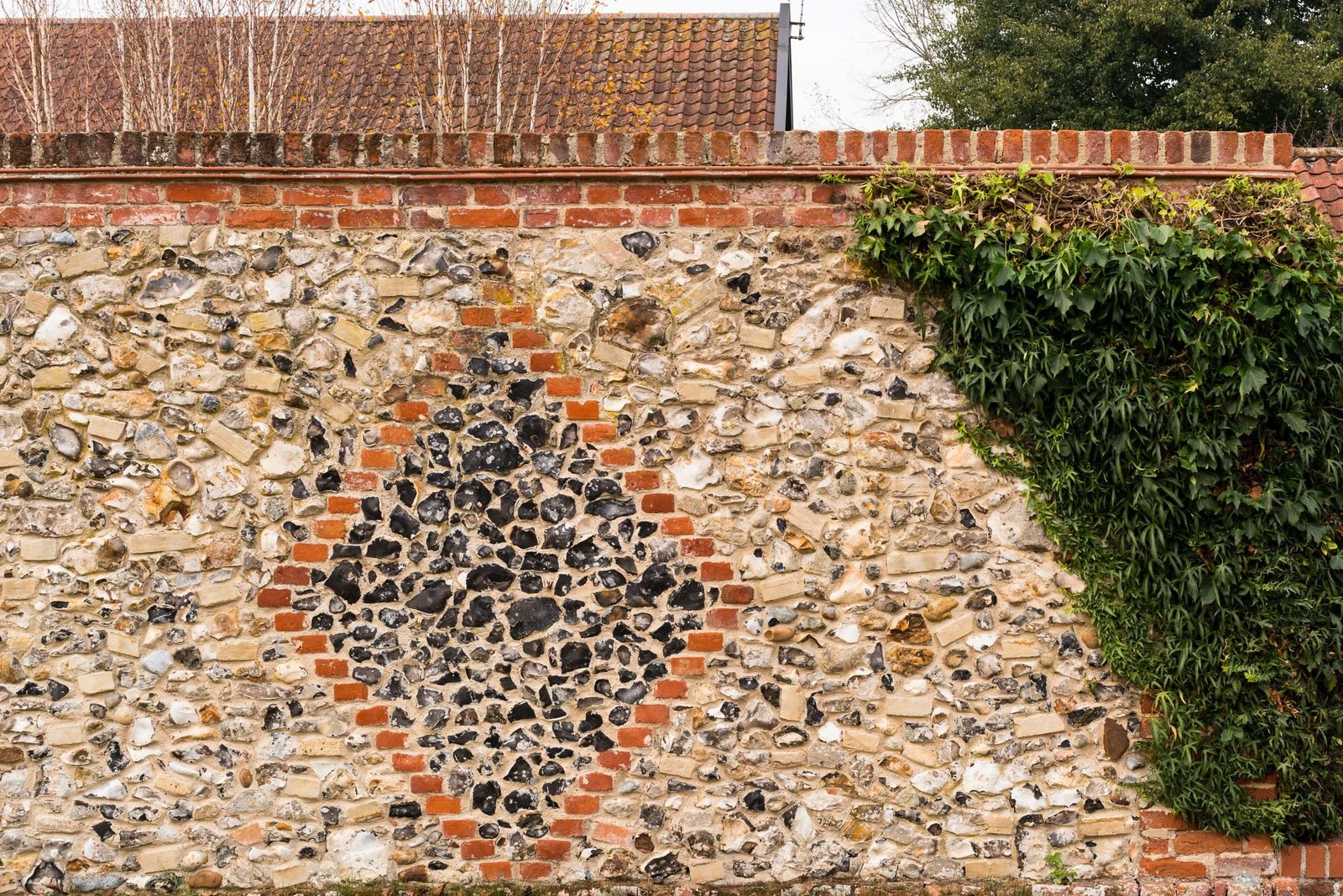 The exterior stone wall.