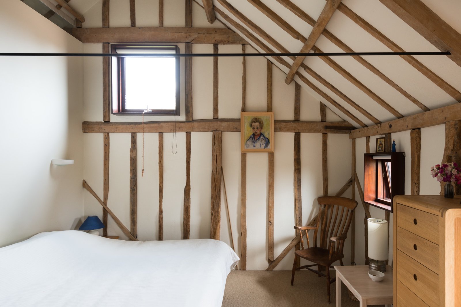 Simple farmhouse bedroom style.
