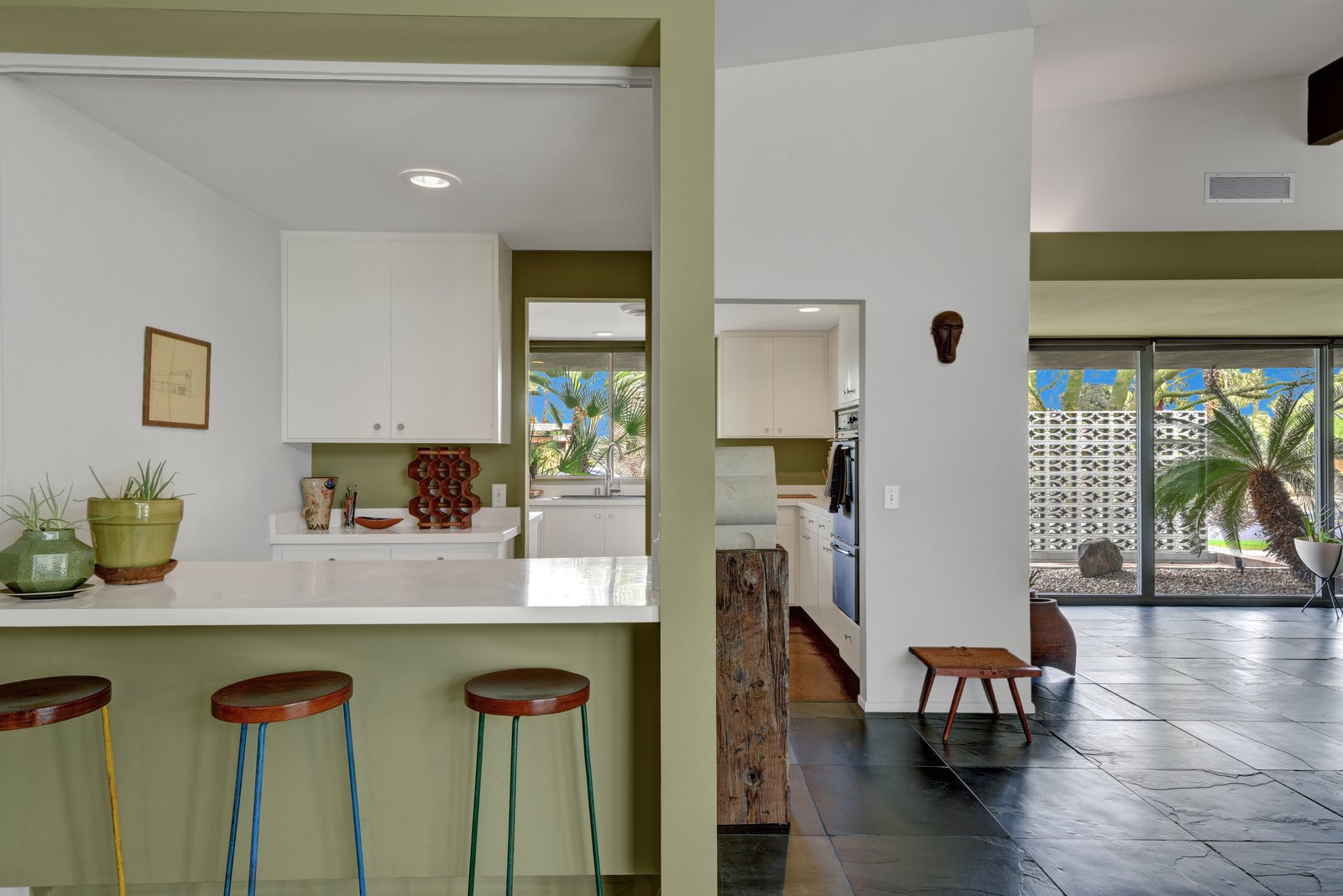 The kitchen features bar seating.