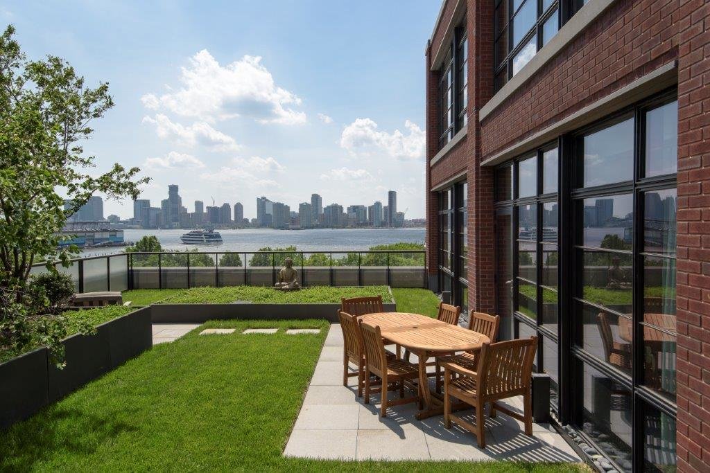 The apartment comes with a 1,500-square-foot landscaped terrace with stunning views of the city, along with two smaller patios (one off the master bedroom).