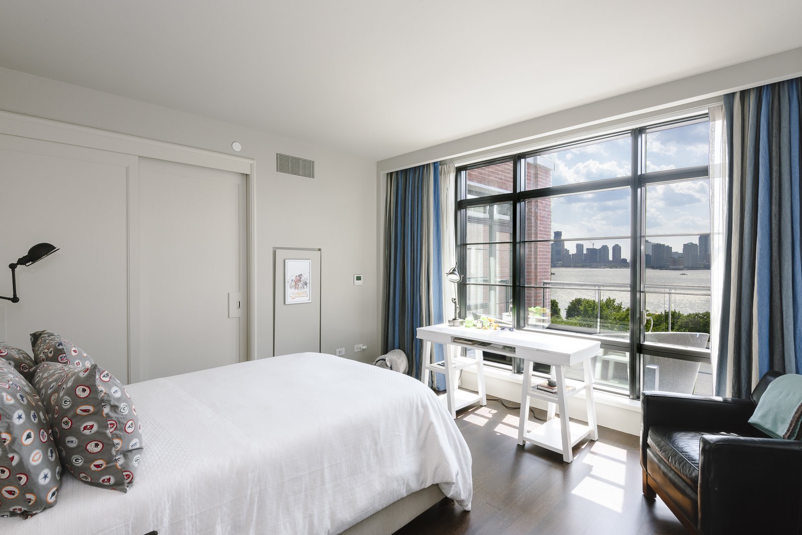 There are three bedrooms with en-suite bathrooms and the master's suite features a walk-in closet.