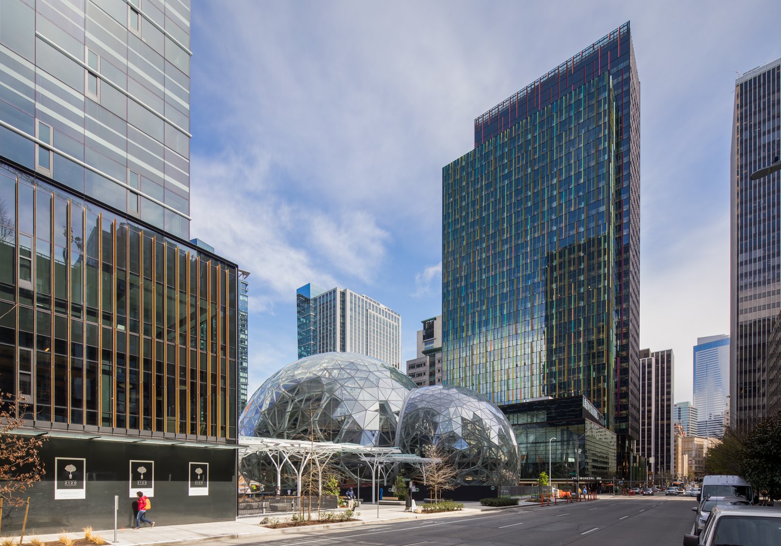 Connected via canopy to the second tower of the new Amazon headquarters, the Spheres are an employee amenity that also provides public benefits, such as public access to the entire first floor, street-level retail and parkland — including a public dog run — on the surrounding site.