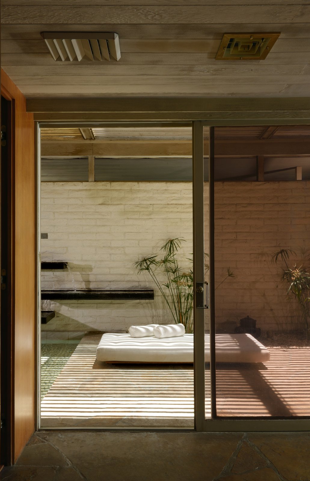 An interior atrium with a fountain is adjacent to the master bedroom suite.
