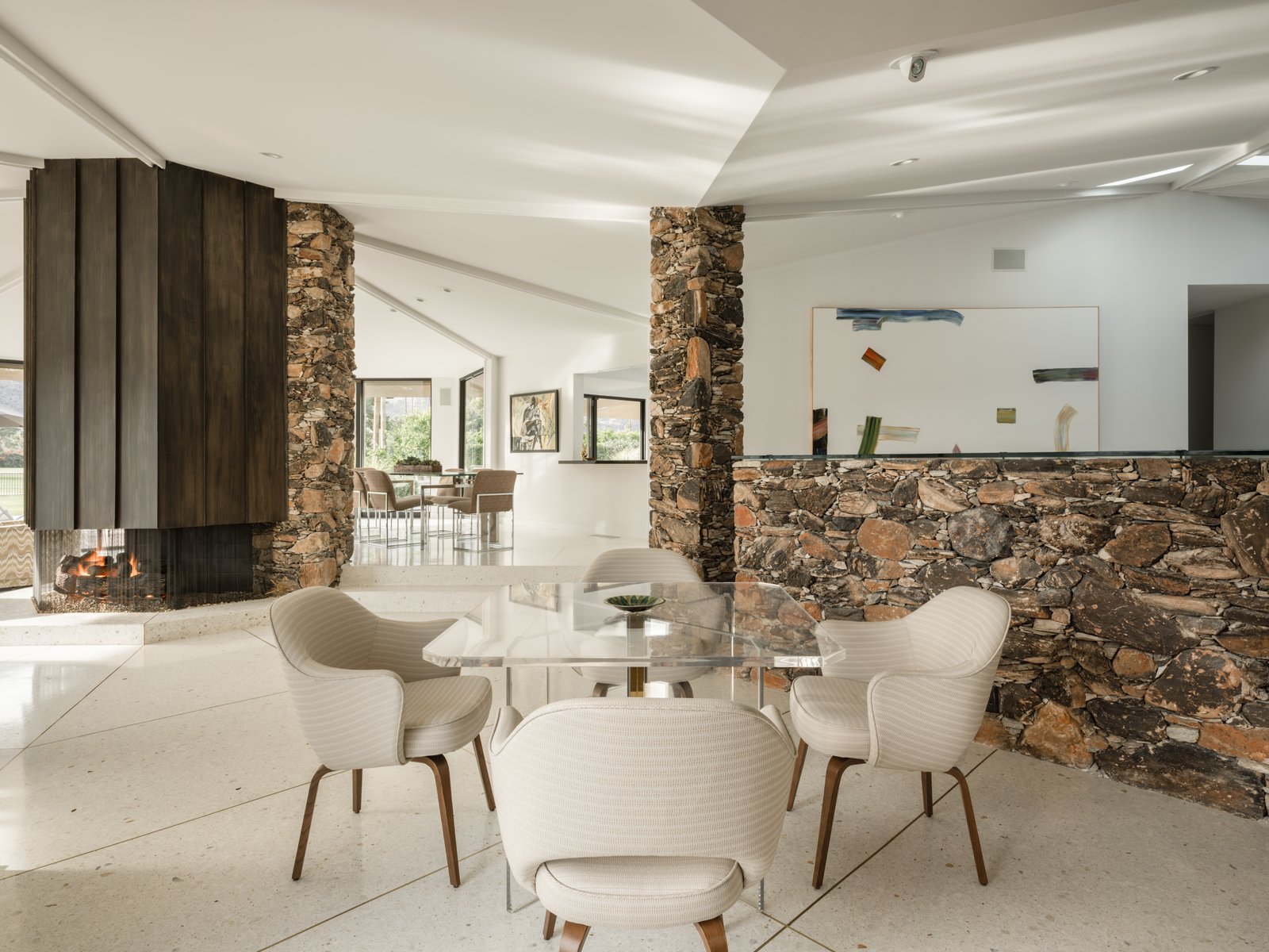 A central fireplace is the focus of the living area.