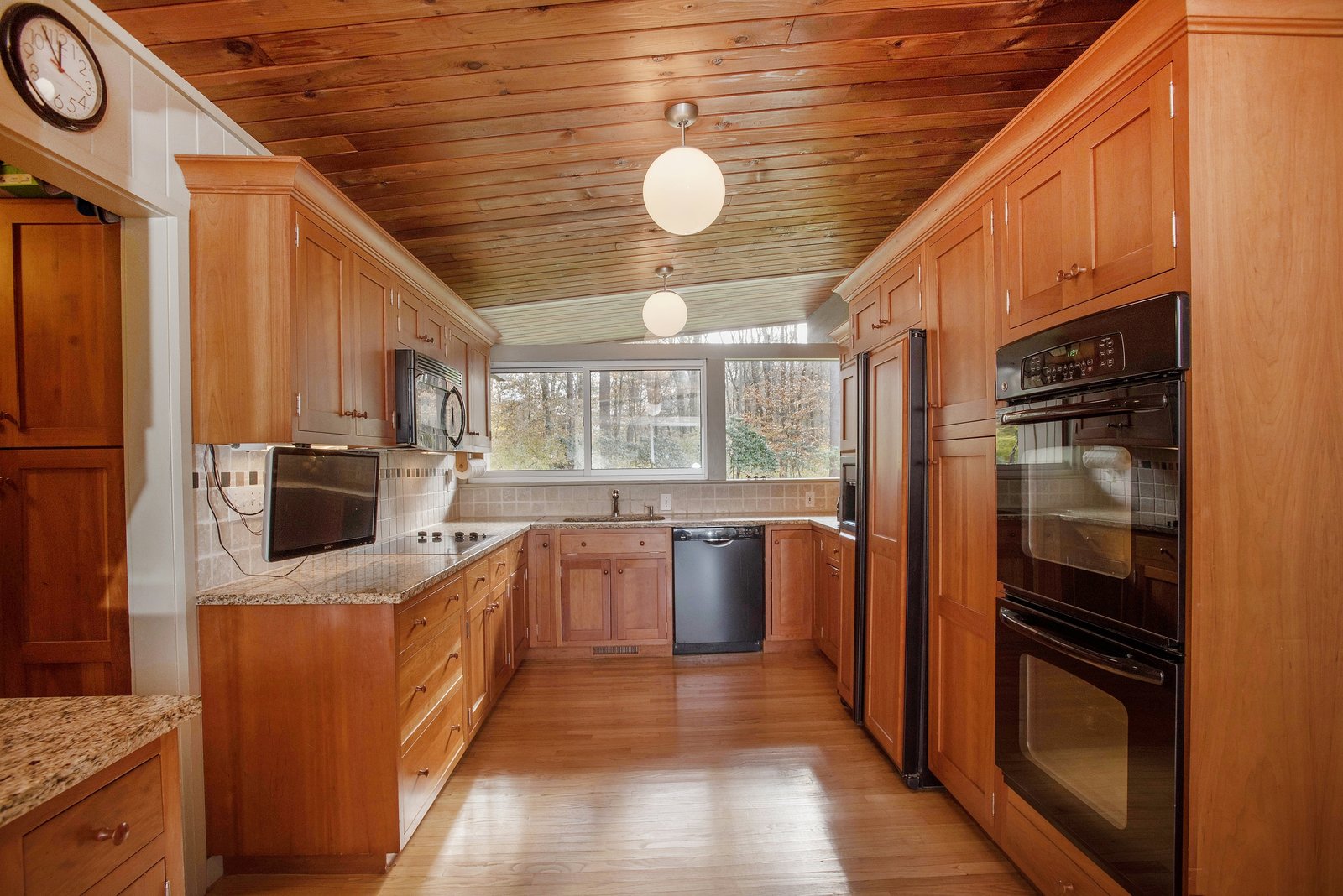 The kitchen has plenty of storage space.