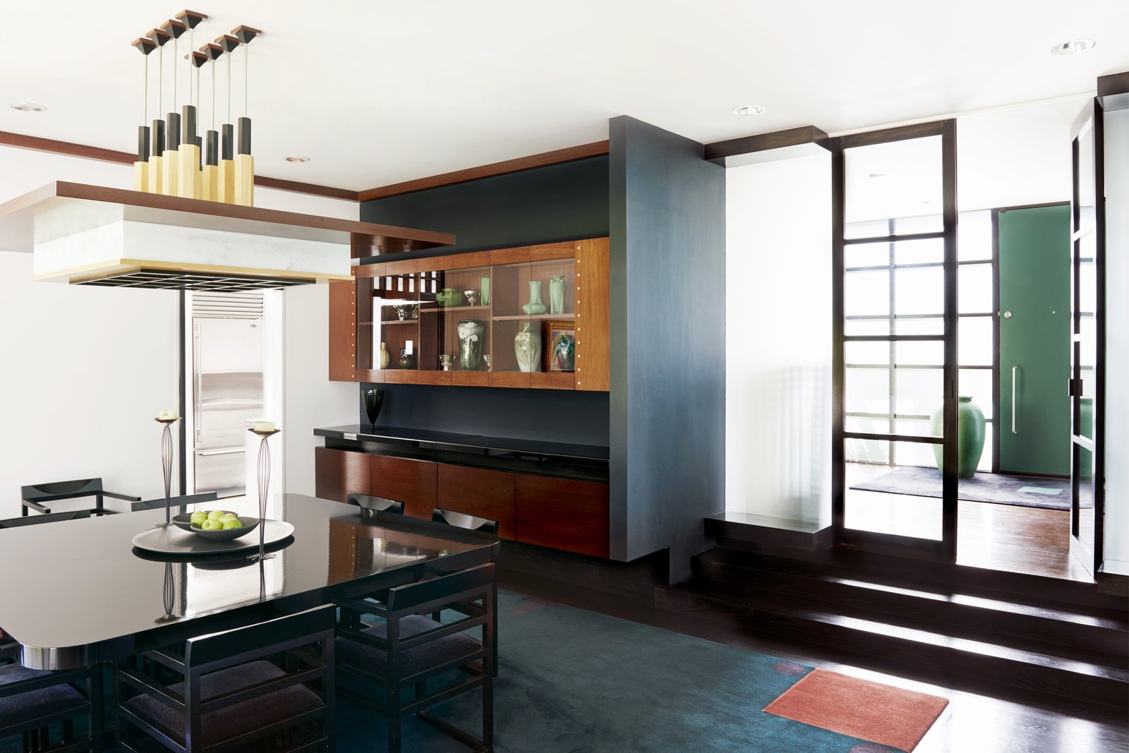 A few steps down leads to a formal dining area.