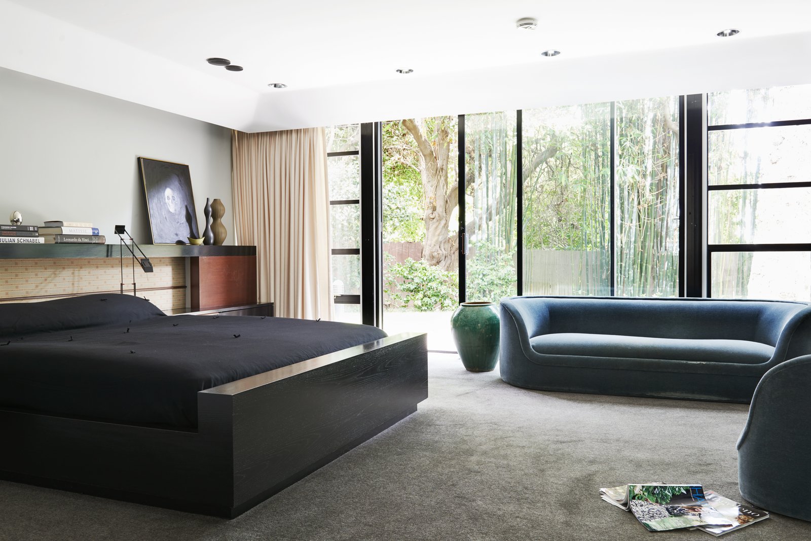 The master bedroom has its own private wing overlooking a garden.