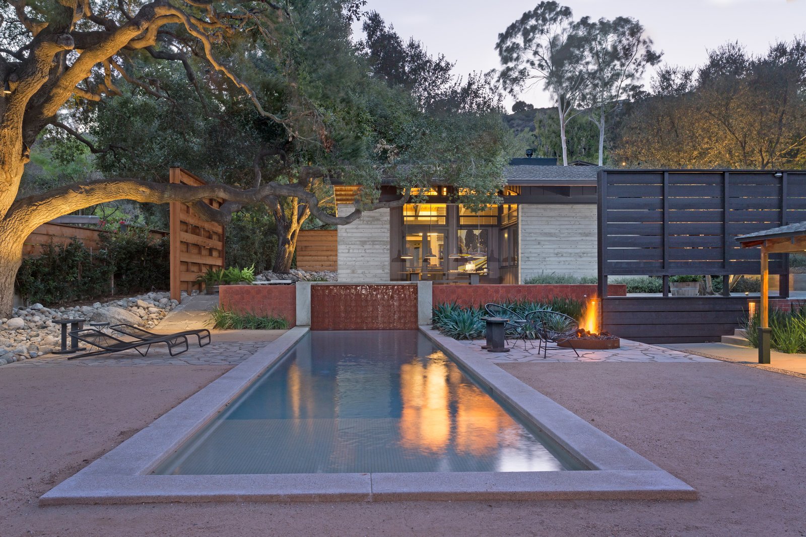 The courtyard in the center of the compound opens with a lovely lap pool.