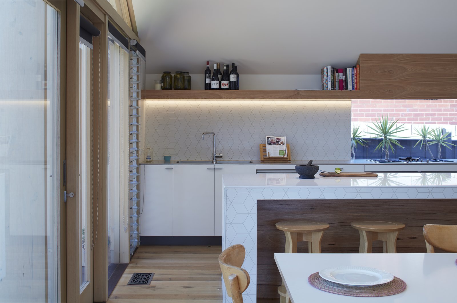 The extension created an open kitchen as well as additional interior space for dining and living.