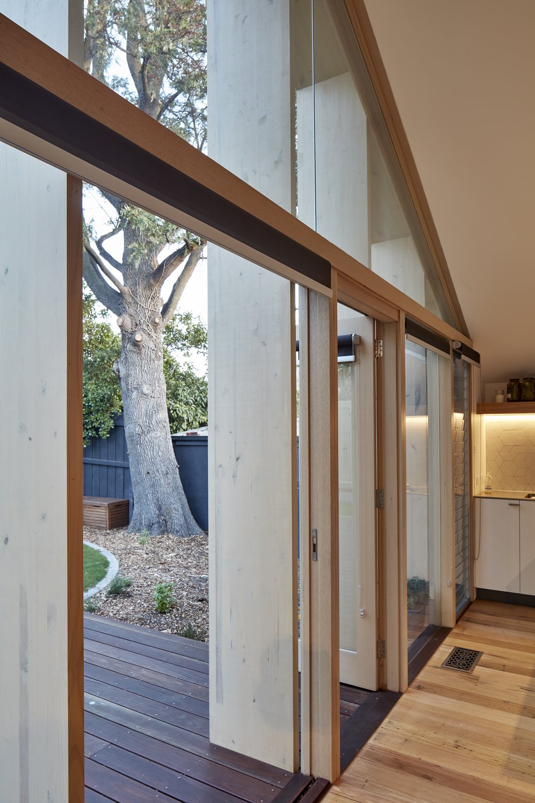 The wood was simply stained and left in its natural state, and reduced the need for more costly structural steel.
