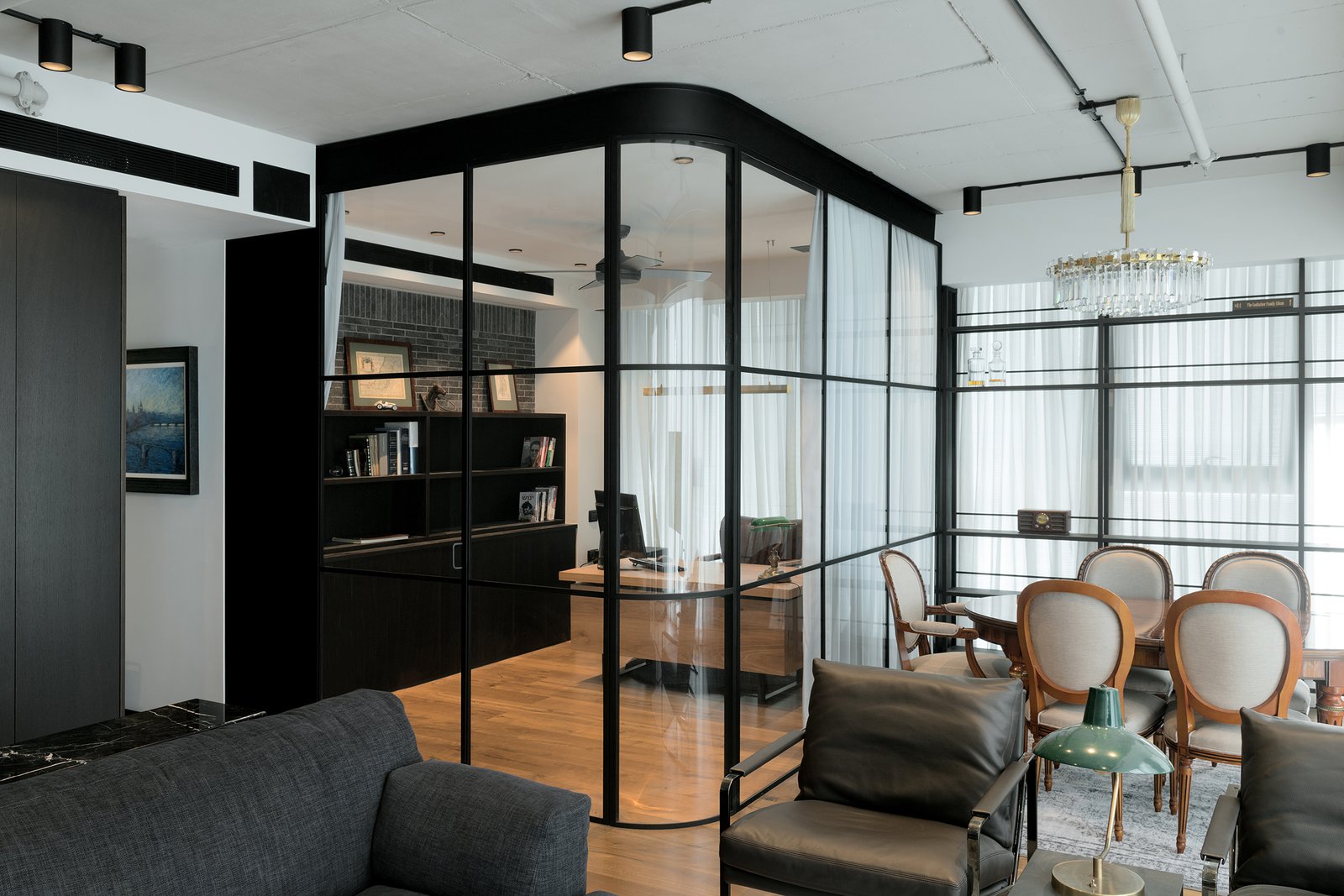 The concrete ceiling was intentionally left exposed so that the lighting systems are visible.