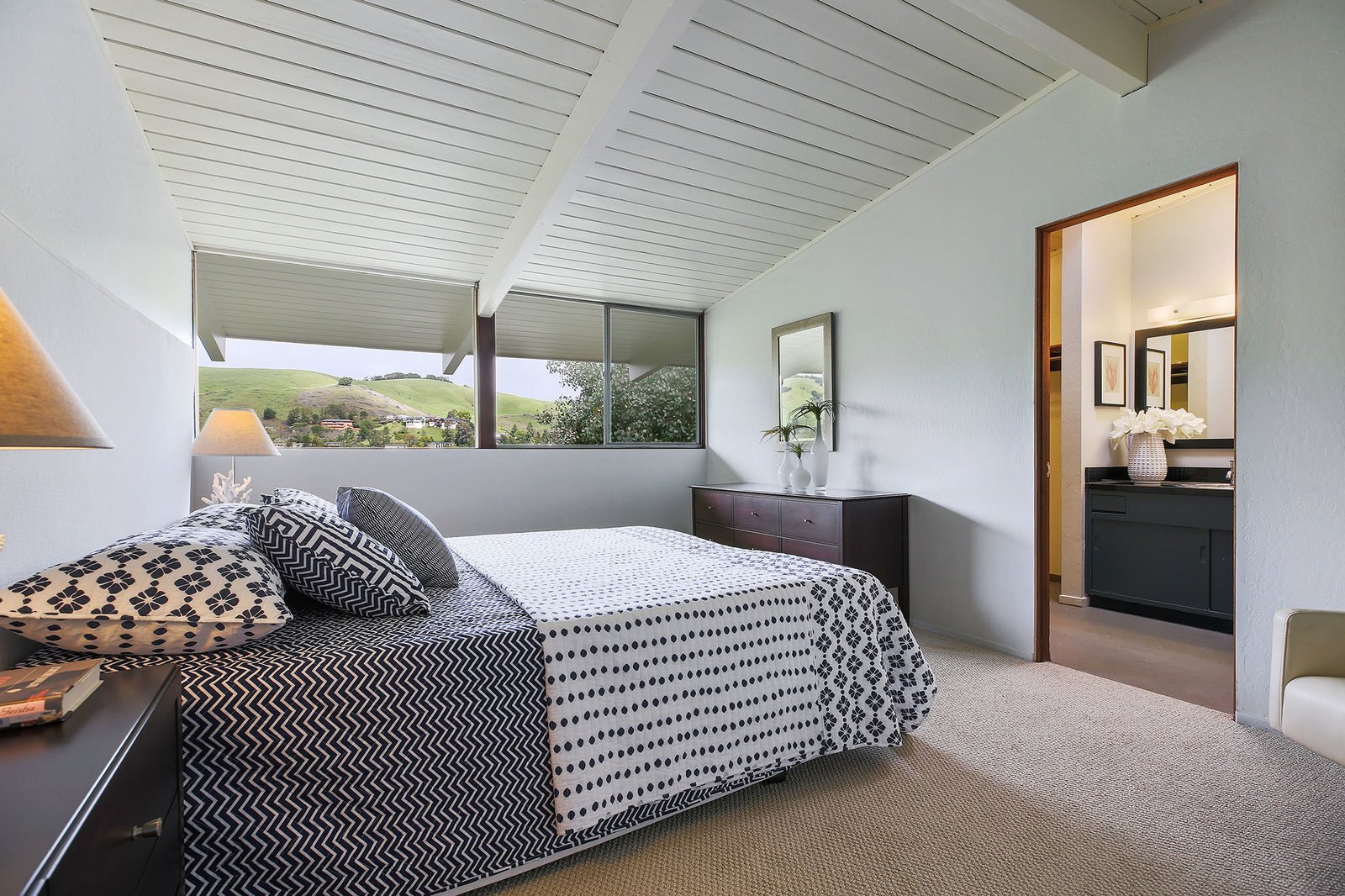 The master bedroom has an en-suite bathroom and a large walk in closet.