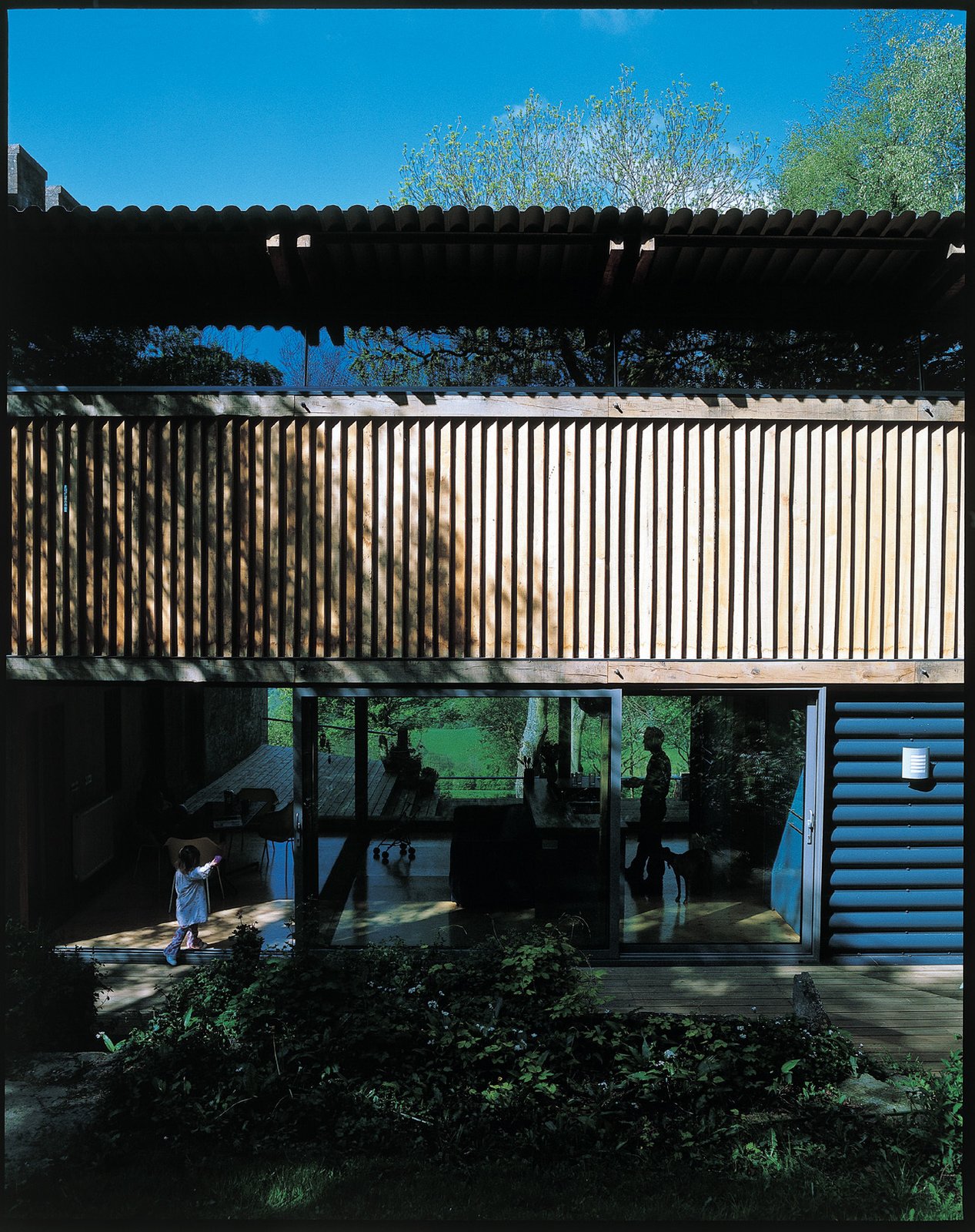The modern timber-framed addition.