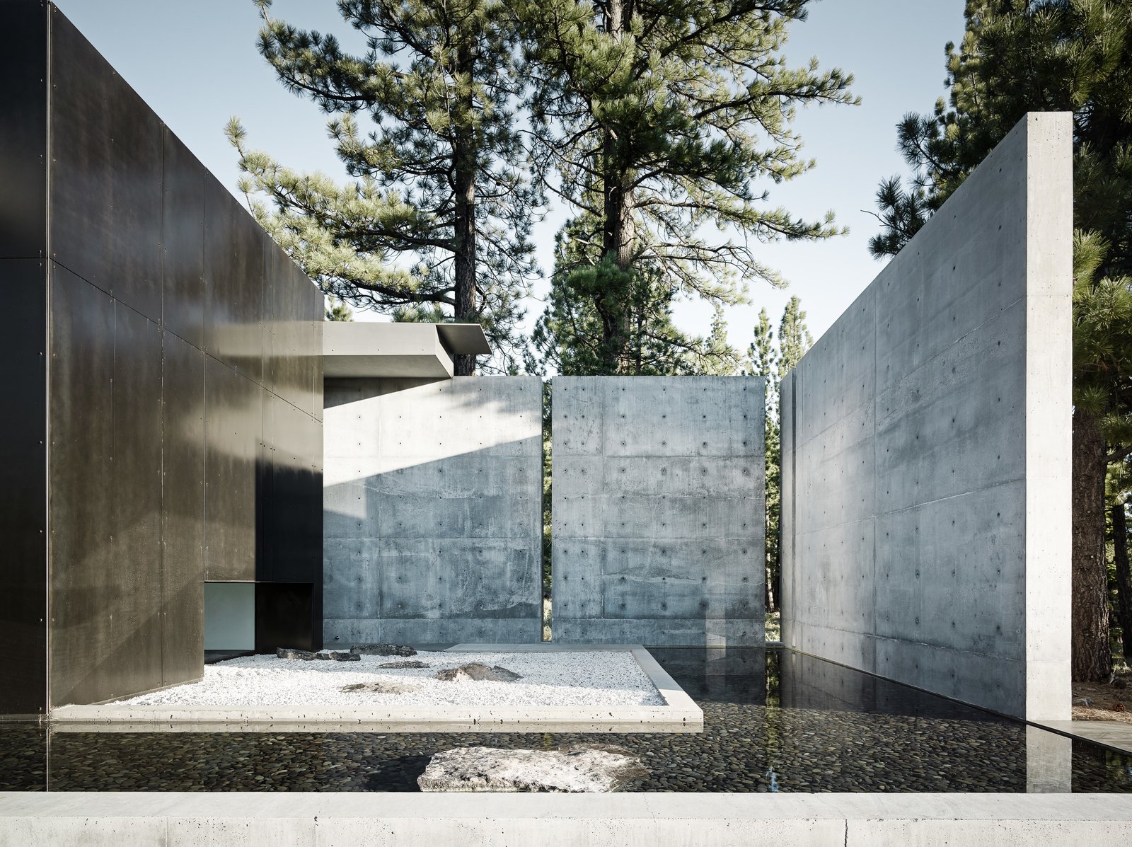 Large concrete walls provide both privacy and shade.