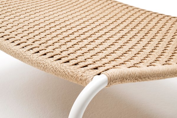 Detail of the 'Cellulosa Frog' armchair, which features a woven two-thread cellulose cord over a painted steel frame.