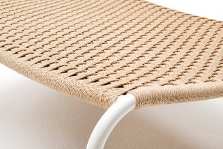 Detail of the 'Cellulosa Frog' armchair, which features a woven two-thread cellulose cord over a painted steel frame.