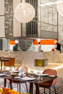 GM Architects' Latest Project: Harmonizing Two Distinct Mediterranean Identities - Photo 5 of 6 - The Sofitel restaurant, Le Marche Des Saveurs, prepares a fusion of Moroccan, French, Asian and Mediterranean cuisine, offering something for everyone. 