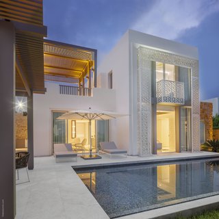 GM Architects' Latest Project: Harmonizing Two Distinct Mediterranean Identities - Photo 1 of 6 - Open-corridor passageways, balconies, and overpasses designed by GM Architects, create a smooth integration between indoor and outdoor spaces at the Sofitel Tamuda Bay. 