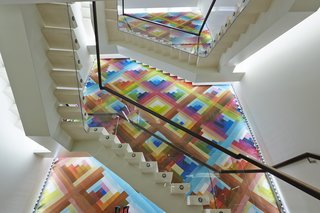 Mural Artist Sets the Scene at Longchamp’s Flagship Store in London - Photo 3 of 4 - The mural measures roughly 39 feet high by 16 feet wide, its colorful tessellation the backdrop against which other architectural elements cohere. 