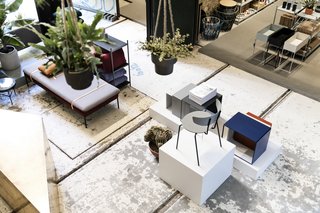 A Retired Copenhagen Power Plant Hosts a Design Pop-Up - Photo 3 of 4 - Potted plants hang in a curtain from the upper stories.