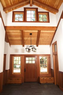Beauty and Brains: Building Sustainably With Redwood - Photo 5 of 6 - A home in Sonoma County, California uses redwood for the interior beams, trim, and entryway storage to evoke a pastoral warmth.