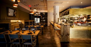 The D-Mitri digital audio platform uses a patented algorithm to manage 24 cardiodid microphones, 34 UP-4XP loudspeakers, and 12 MM-10XP subwoofers. Live piano music from the lounge also permeates the dining room through sound distribution.