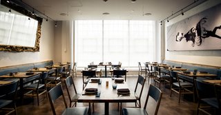 Six Stella-8C loudspeakers cover the private dining room. A photograph of flamenco dancers camouflages the sound-absorptive Libra™ acoustic image system.