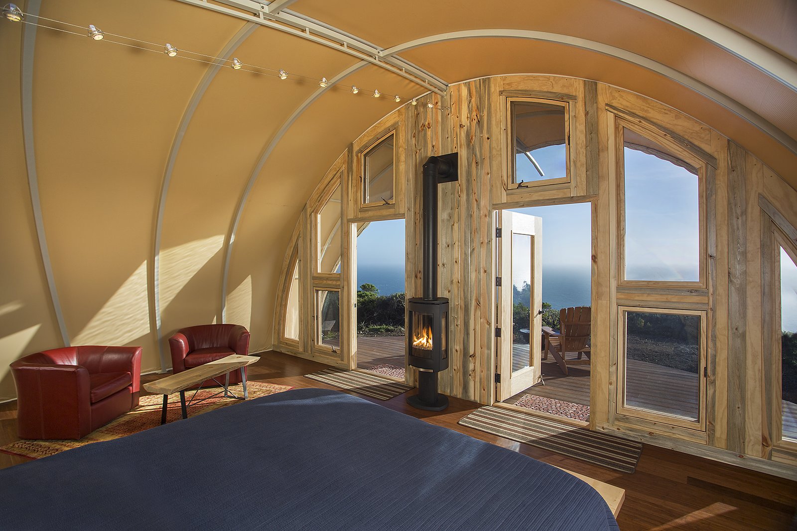 The tent fabric guards against the torrential wind and rain that can sweep through Big Sur. Parr customized the entryway to maximize the view.