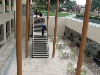 Setting Creative Solutions in Stone - Photo 4 of 6 - Concrete closed riser Steptreads at Claremont McKenna College are durable and easy to maintain. In addition to being welded to steel channels, stair treads can be attached to a wood stringer.