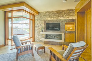 An Architectural Feat in Silicon Valley Tames a Rocky Landscape - Photo 6 of 8 - Custom inverted windows structurally express the interplay of interior and exterior. "Anywhere you look, there are intricate windows," says Yaconelli. "The interiors are wood, which is really rich and comfortable."