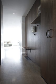 The Whole House System That Unifies Every Room - Photo 5 of 8 - A wide array of clear and tinted veneers are available for wood products, which include multiple species, tones, and layup options. Above, an Opencase system outfits an entryway with versatile storage options. 