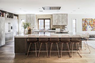 One of the elements that Lefebvre had his heart set on was a copper sink, though it didn’t go along with the rest of the decor; the copper bar stools by Bend Goods were a serendipitous find that tied the room together.