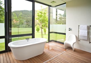 The guest bathrooms are outfitted with showers and tubs that feel close to nature.