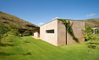 "The sleeping block was designed to be cave-like, where you could retreat to," says van Gass. "The materiality of the project is inspired by vernacular tones and textures."