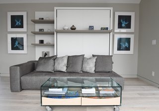 Interior designer Shane Cook chose gray and beige as the predominant colors for the home, using blue accents to liven up the space.