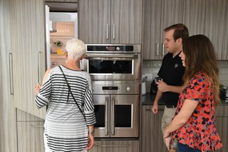 The cabinets disguised seamlessly integrated appliances like the custom fridge and dishwasher.