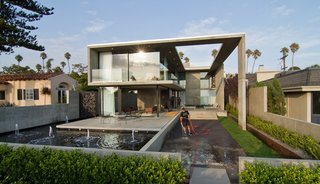 This Architect's Home Embraces Oceanfront Views - Photo 7 of 7 - The fountains installed in the pool contribute to the sound of the nearby ocean and the sense of being in nature.