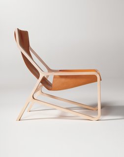 Democratizing Design With a Dose of Humor - Photo 4 of 9 - The Toro Chair has a thick saddle leather sling so you can lounge in style.
