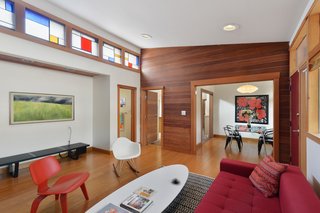 Artists Need Apply: This Midcentury Home Comes With an All-Purpose Workshop for $949K - Photo 2 of 11 - Clerestory windows, outfitted with stained glass in the living room, allow light to bathe nearly every room.