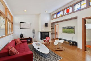 Artists Need Apply: This Midcentury Home Comes With an All-Purpose Workshop for $949K - Photo 1 of 11 - A white brick wall provides visual and material contrast to warm wood elements throughout the home.