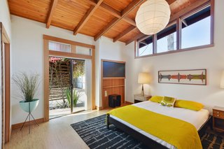 Artists Need Apply: This Midcentury Home Comes With an All-Purpose Workshop for $949K - Photo 5 of 11 - All three bedrooms have cork floors. The master bedroom opens onto the courtyard.