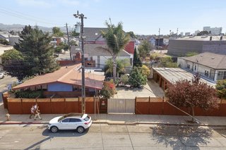 Artists Need Apply: This Midcentury Home Comes With an All-Purpose Workshop for $949K - Photo 11 of 11 - Dean explains that the compound is sandwiched between a private home and an industrial building, making it "literally the transition point from residential to commercial." 