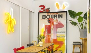 Next-Generation Neon - Photo 2 of 7 - LED neon flex is a string of LED lights encased in PVC, making it durable, flexible, and more energy efficient. Above, a banana ($895) designed in collaboration with Kip & Co hangs alongside What's Up? ($300) bunny ears.