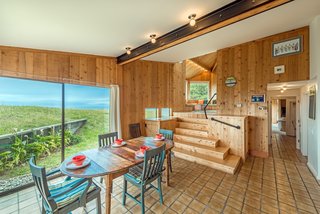Settle in the Celebrated Sea Ranch For Under $2.9M - Photo 2 of 11 - Barring the bathrooms, every room in the house looks out at the ocean. "Even though the house was designed and built before there were any neighbors in view, Moore anticipated them by having no windows to the east apart from a skylight, thus insuring privacy," says co-owner Alison Owings.