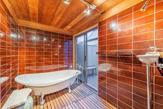 Settle in the Celebrated Sea Ranch For Under $2.9M - Photo 6 of 11 - The freestanding tub in the master bath leads to a private, raised deck.