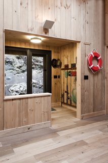 Just Getting to This Remote Patagonian Retreat Is an Adventure - Photo 3 of 8 - A mudroom has storage space for fishing gear, wet shoes, and jackets.