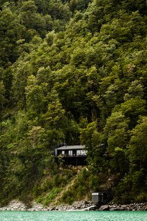 Just Getting to This Remote Patagonian Retreat Is an Adventure - Photo 1 of 8 - "The house almost flies over the lake with an amazing view of the volcanoes and an idyllic landscape that you can never get tired of," says Chadwick. 