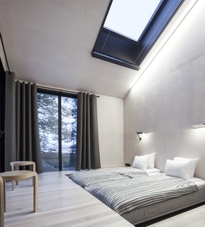 Go Stargazing in Snøhetta’s Towering Addition to Sweden’s Treehotel - Photo 5 of 7 - The bedrooms are placed on opposite ends of the cabin, each equipped with sliding doors that lead to the netted terrace. Above, skylights offer additional views of the stars.
