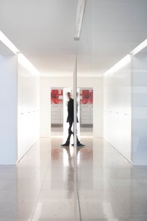 A lower level is currently in use as a second lounge, but it can also be converted into a home theater, gym, or wine cellar.